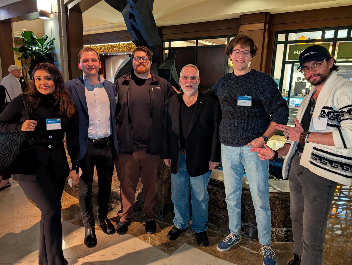 Parmita at a gathering with Bob Gourley and others, from her November 2024 public post.