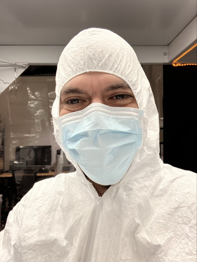 Sasaan wearing protective cleanroom clothing in our first small Arizona cleanroom.